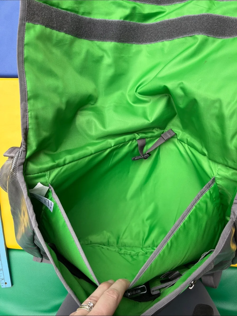 Patagonia’s Gray Messenger Bag with Green Accents older black hole